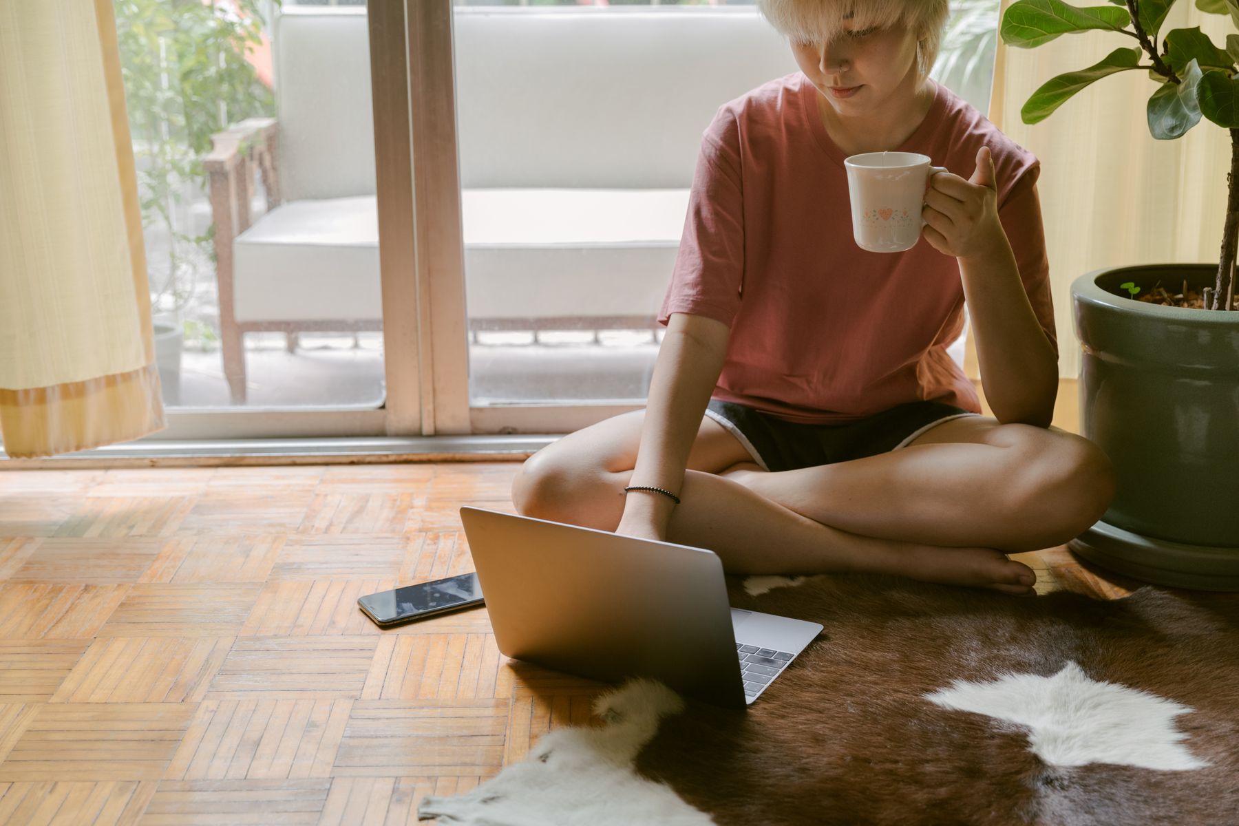 A woman using her laptop at home